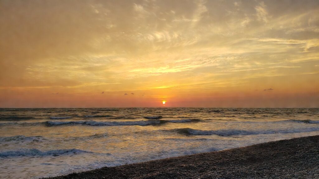 Sunrise ocean symbolising propranolol's role in preventing PTSD after trauma
